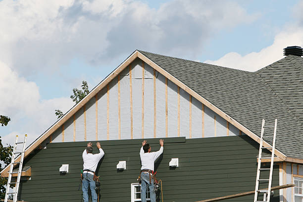 Professional Siding Replacement technician working in Drake, CO